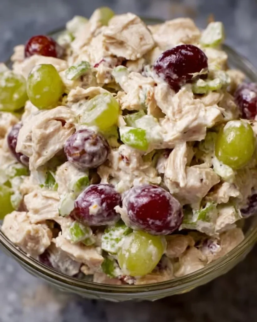 Delicious chicken salad served in a bowl with fresh vegetables