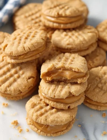 Homemade Nutter Butters Cookies on a plate, ready to be enjoyed.