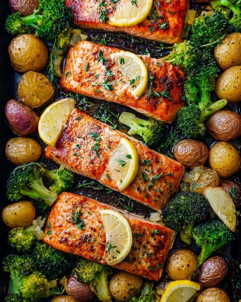 Lemon butter salmon served with roasted potatoes and broccoli on a plate