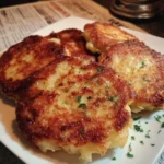 Old-fashioned potato cakes served with a side of dipping sauce