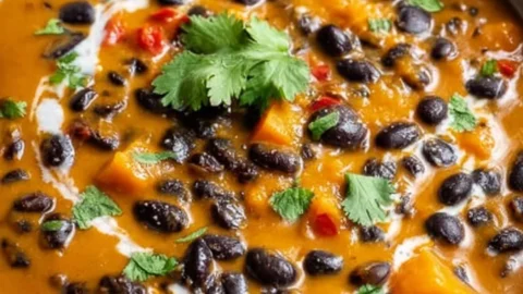 Bowl of Pumpkin Black Bean Soup garnished with cilantro