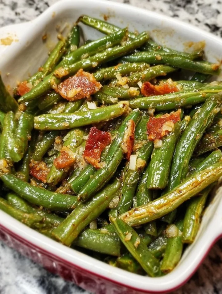 Freshly cooked simple green beans side dish on a plate