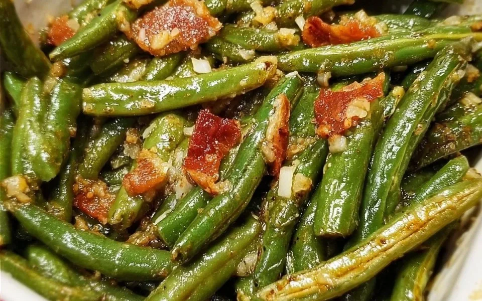 Freshly cooked simple green beans side dish on a plate