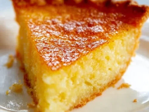 Delicious slice of Southern Chess Pie on a rustic plate.