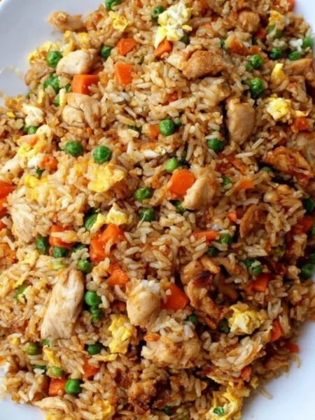 Delicious Chinese Chicken Fried Rice served in a bowl with vibrant vegetables