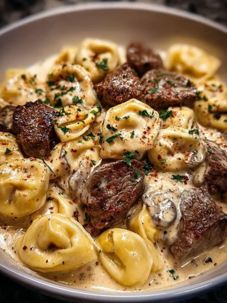 Delicious Cracked Garlic Steak Tortellini in rich Creamhouse sauce