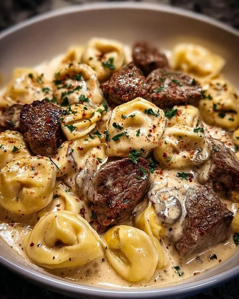 Delicious Cracked Garlic Steak Tortellini in rich Creamhouse sauce
