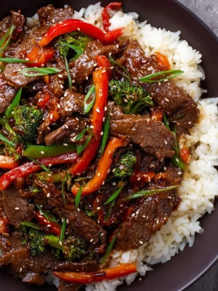 Plate of EASY Mongolian Beef with vegetables and rice