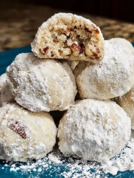 Delicious Pecan Snowball Cookies dusted with powdered sugar.