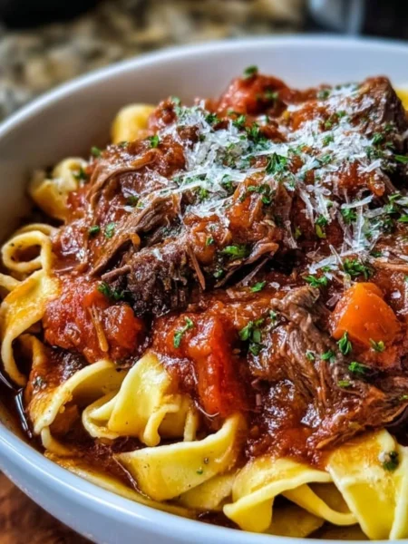 Delicious Sunday Slow Cooker Beef Ragu served with pasta