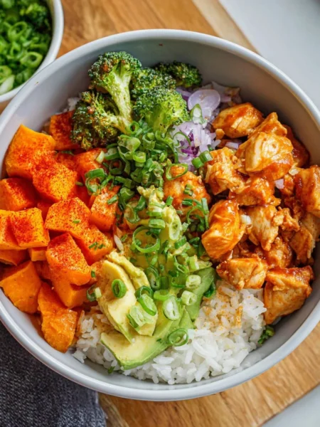 Healthy Chicken Sweet Potato Rice Bowl with vegetables and spices