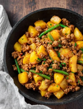 One pot ground beef and potatoes dish in a serving bowl.
